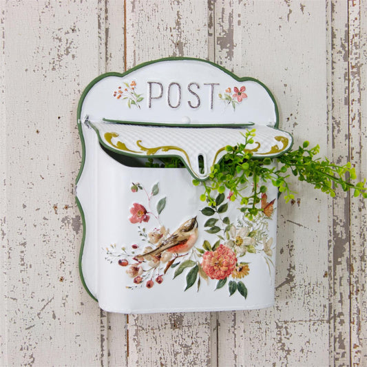 Beautiful decorative metal post box, white with green trim on edges.  The front features a gorgeous scene of a bird, butterfly and florals.  The post box measures 12 x 10 x 4